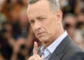 Tom Hanks, a longtime critic of using AI in film and TV, warns fans about a dental plan video using a deepfake AI version of him: ‘We saw this coming’