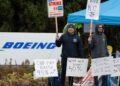 Boeing union backs sweetened contract offer that could end strike, sets vote for Monday