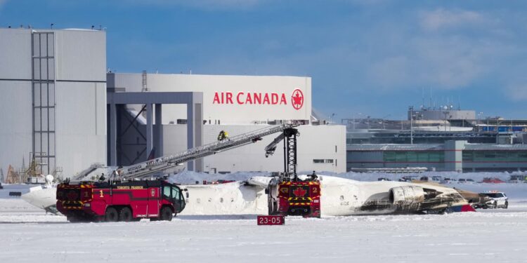 Delta plane crashes on landing at Toronto airport, injuring at least 18 Delta plane crashes on landing at Toronto airport, injuring at least 18