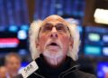 Stocks slide deeper into the red after Fed chair’s ‘stagflation’ warning reignites tariff fears