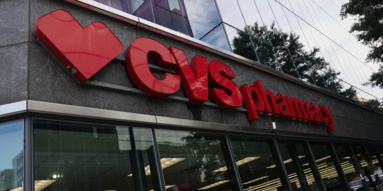 CVS tops estimates, hikes guidance as insurance business shows some improvement