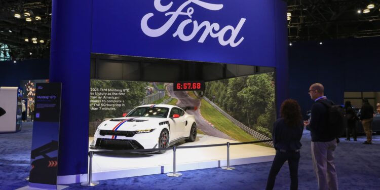 Ford reinstates full-year outlook, including billion tariff hit Ford reinstates full-year outlook, including billion tariff hit
