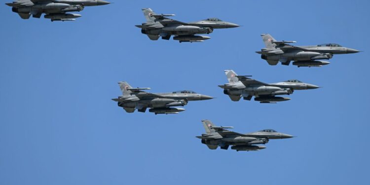 Poland scrambles jets, shuts key airport amid drone threat | Fortune Poland scrambles jets, shuts key airport amid drone threat | Fortune