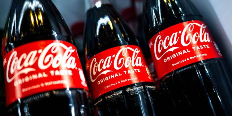 Coca-Cola tops earnings and revenue estimates but says demand for drinks is still soft Coca-Cola tops earnings and revenue estimates but says demand for drinks is still soft