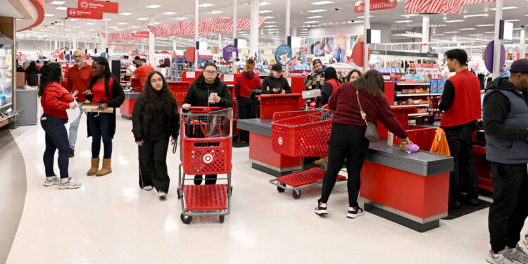 Target steps up investment in store staffing, cuts about 500 other roles to help fix customer experience
