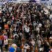 Pricy airfare, airport chaos test travelers’ willingness to fly this year