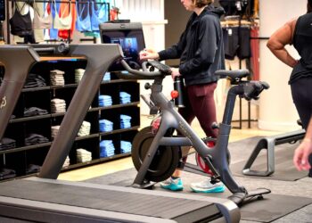 Peloton stock rises as higher subscription prices help company drive a profitable quarter