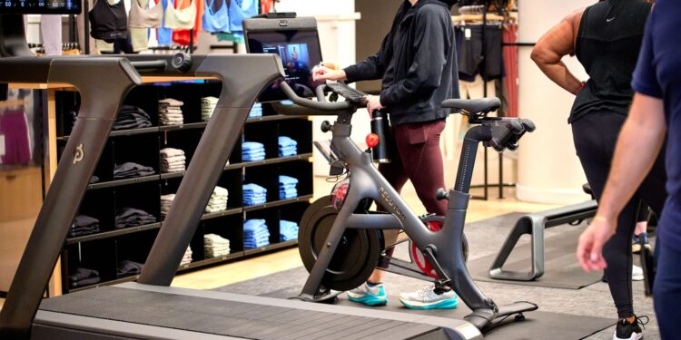 Peloton stock rises as higher subscription prices help company drive a profitable quarter