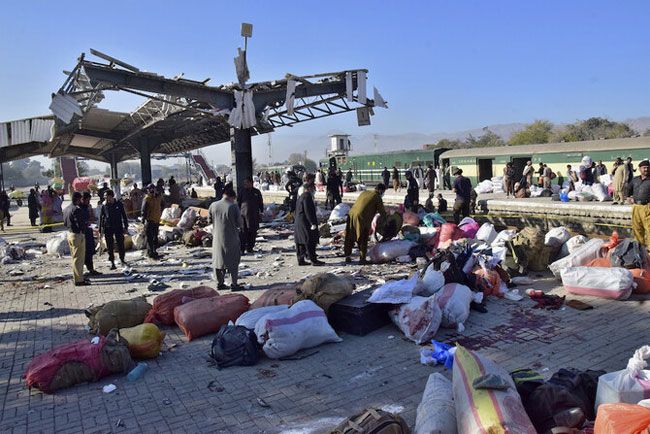 At least 24 killed in Pakistan train station bomb blast, police say