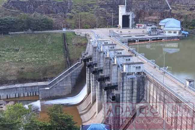 Sluice gate of Upper Kotmale Reservoir opened