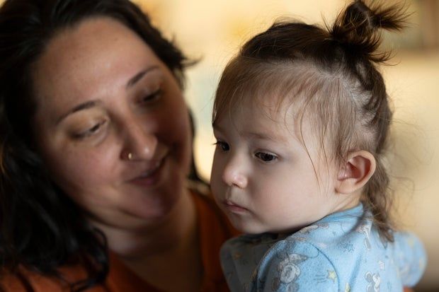 KFF Health News - Sara England's infant son