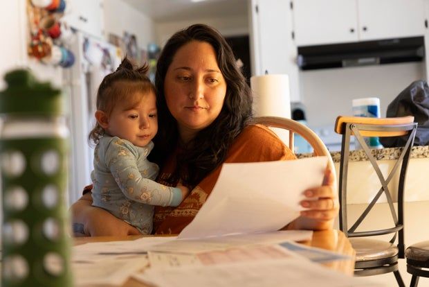 KFF Health News - Sara England's infant son