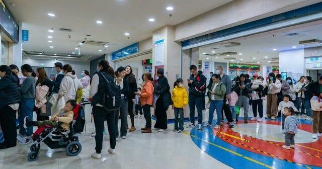 Chinese hospitals overwhelmed with spike in respiratory illnesses, mostly in children