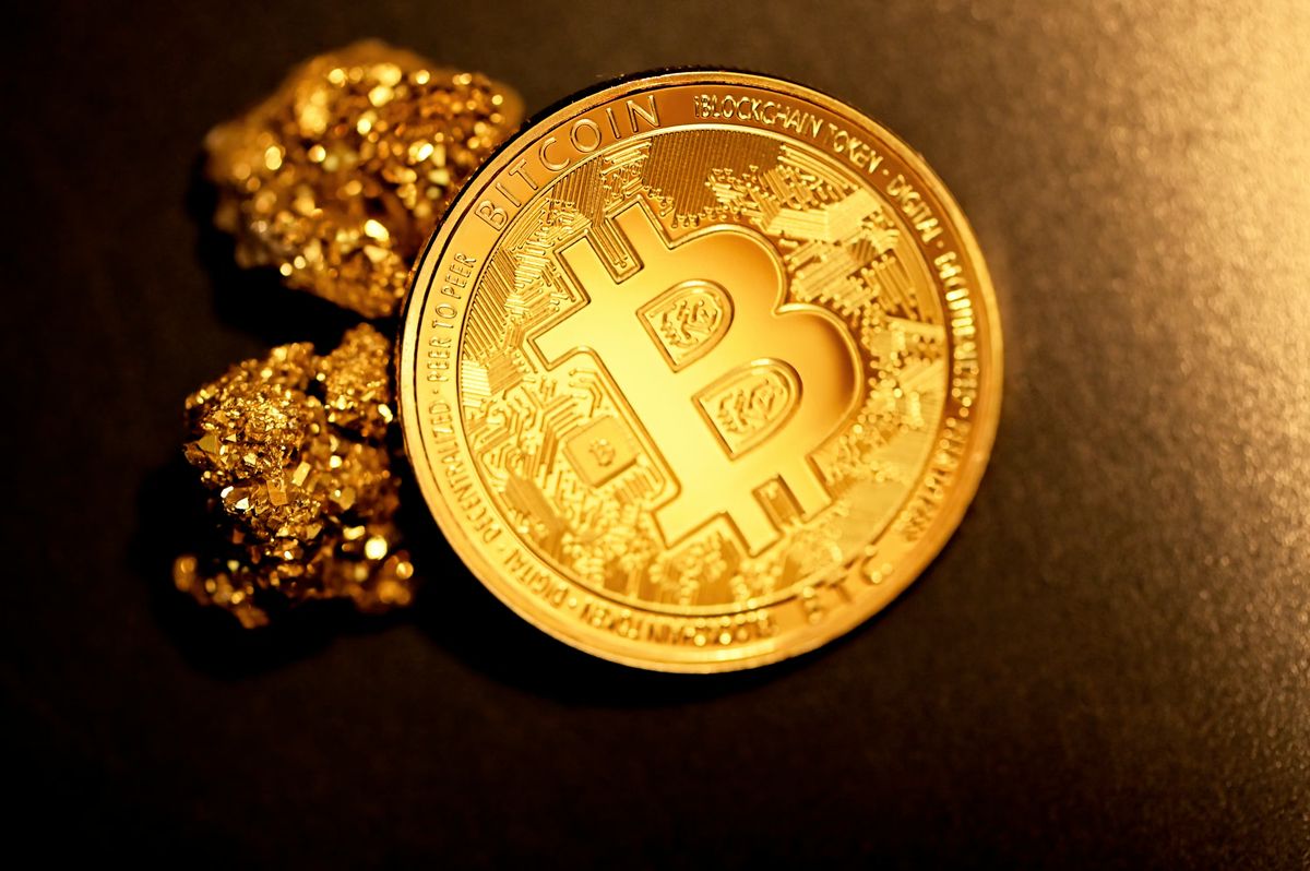 With Bitcoin Below K, Cathie Wood Reframes The Narrative Around Gold