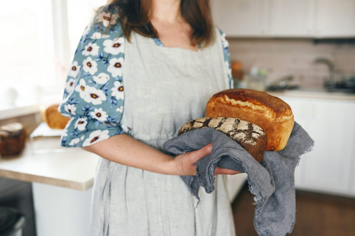 Burned out workers ditch hustle culture for 'slow living' trend of old-fashioned wood-burning stoves and unstructured play 1 055b742d GettyImages 1469973111 e1734379615381