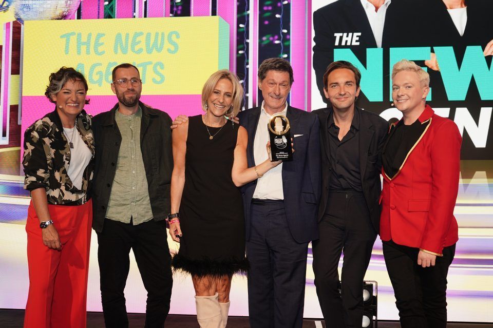Political podcasting is the hottest career right now 4 The News Agents's Emily Maitlis (holding the trophy) with Jon Sopel (M) and Lewis Goodall (R).