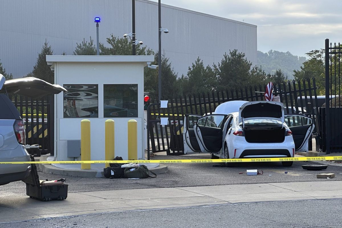 'This was a targeted attack on this building': Car rams Pittsburgh FBI building, driver throws American flag over the gate | Fortune 1 89c63650 AP25260464421828 e1758129813341