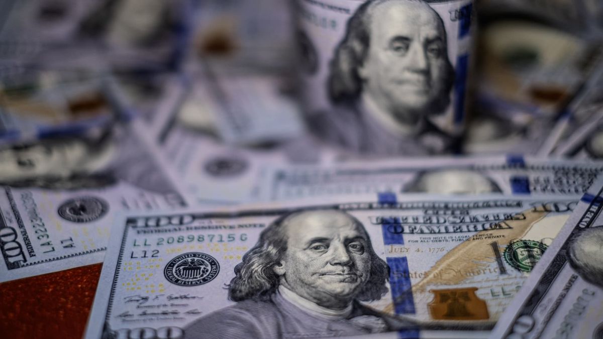Dollar claws back losses from U.S. government shutdown, turns slightly higher