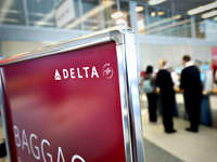 Why airlines are raising baggage fees — and charging you more at the airport 1 How Delta moves 100,000 bags daily at the world's busiest airport
