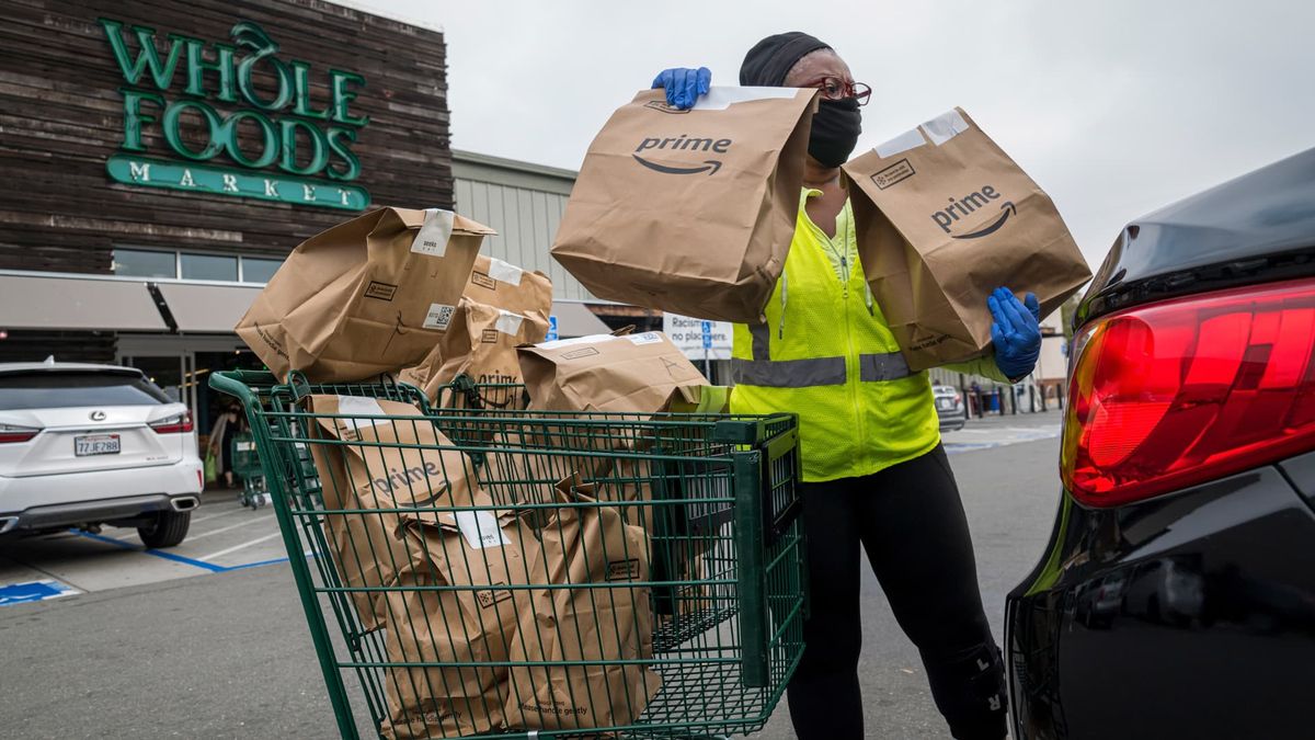 Amazon tests adding robot warehouses to Whole Foods so shoppers can pick up other orders at checkout