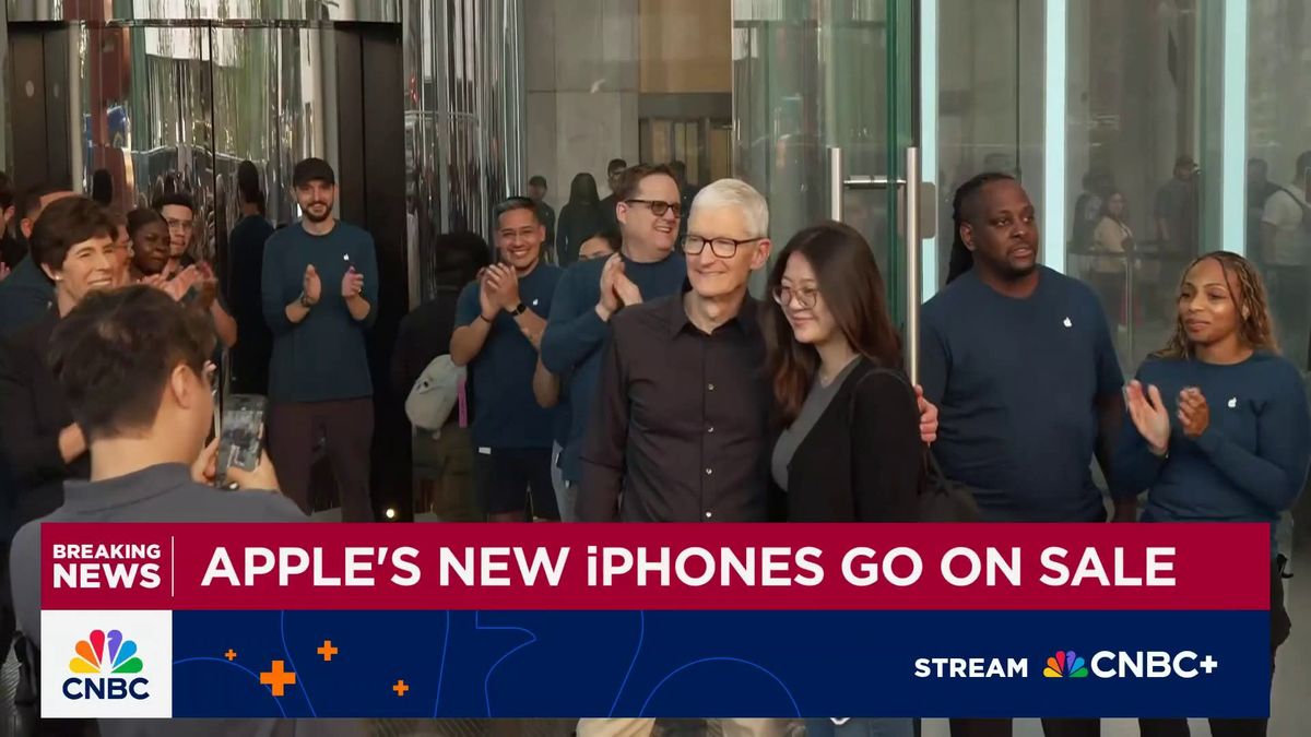Apple CEO Tim Cook says iPhone price hikes are not tied to tariffs 1 iPhone 17 goes on sale: Apple CEO Tim Cook opens flagship Fifth Avenue store in New York City
