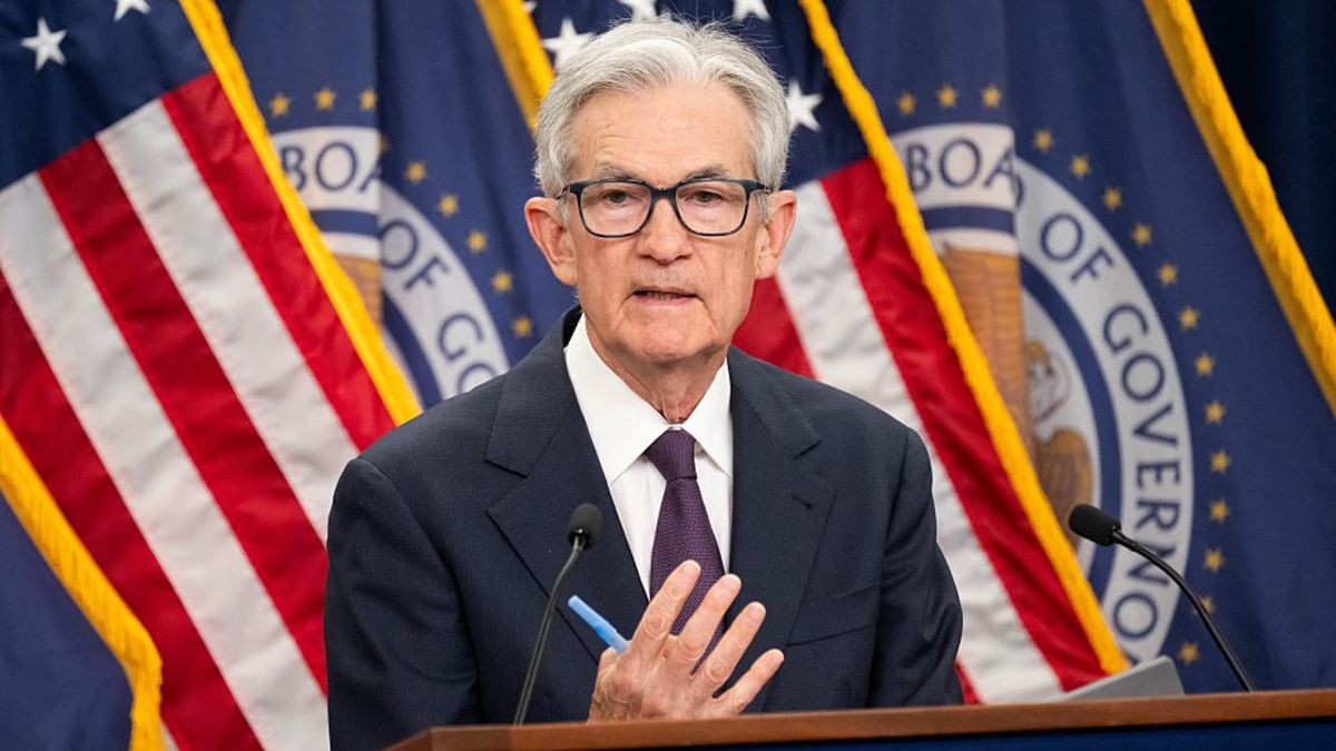 Fed holds key rate steady, still sees two more cuts this year
