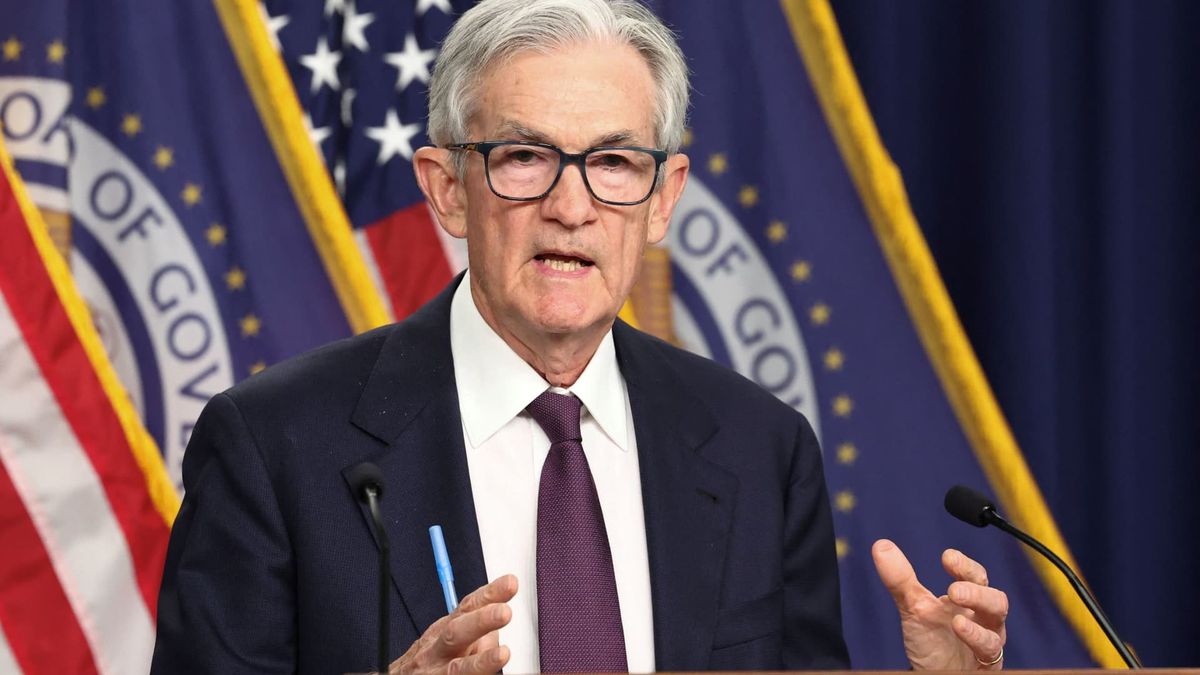 Divided Fed holds key interest rate steady, defying Trump’s demands for aggressive cuts