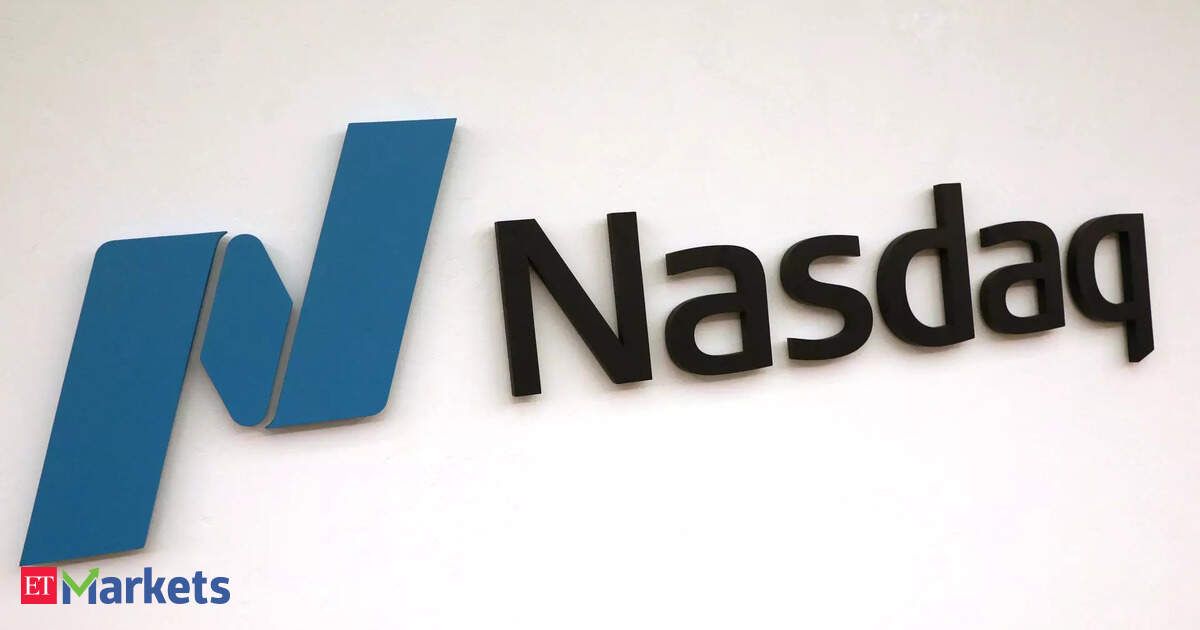 Nasdaq slips from near all-time high, Dow up modestly ahead of inflation data