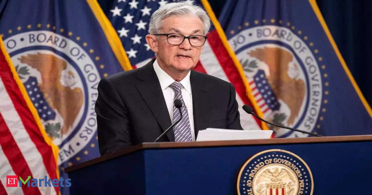 Fed holds rates steady again and pivots toward cuts in 2024