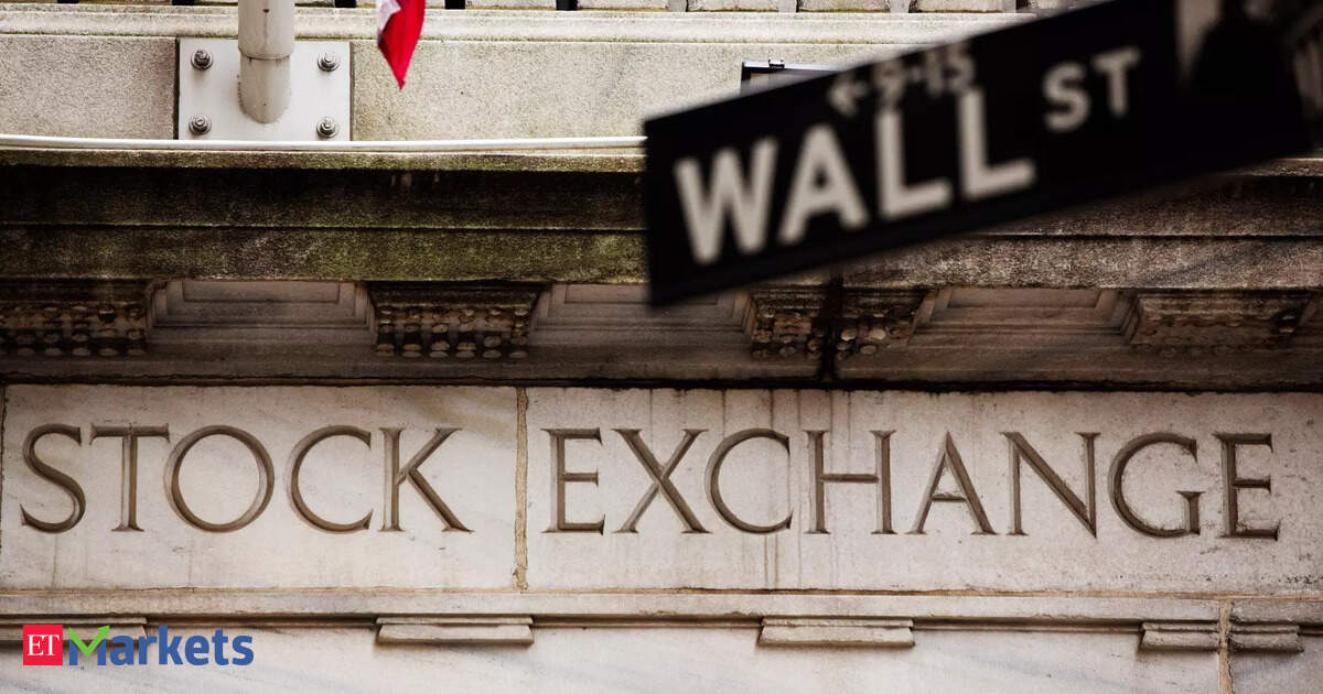 Wall St futures edge lower as investors await data, policy cues