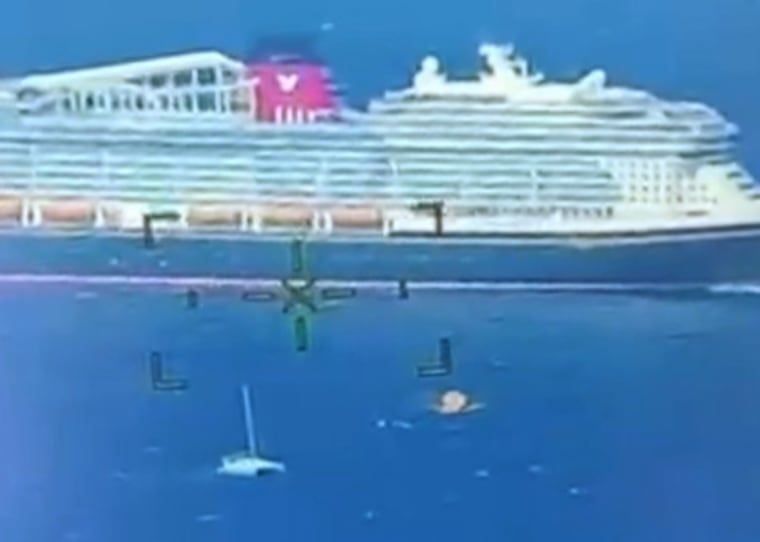 Disney cruise ship rescues sinking catamaran, saves 4 people in Atlantic near Bermuda 1 A life boat from the cruise ship Treasure heads toward a disabled Catamaran.