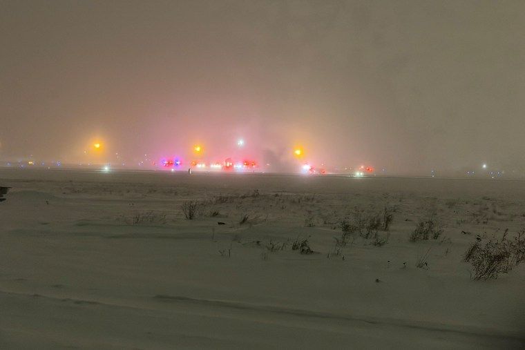 At least a half-dozen dead after business jet crashes during takeoff in Maine 1 Lights are seen in the distance Sunday night following the crash of a private Bombardier Challenger 600 jet at Bangor International Airport in Maine.