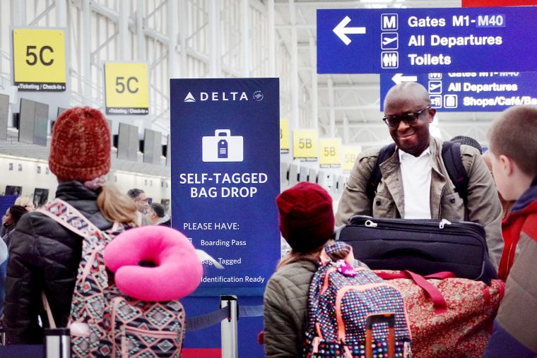 This summer’s travel trends: Shorter, cheaper trips and more driving — unless you’re rich 1 Passengers check in at Chicago’s O’Hare International Airport in January.