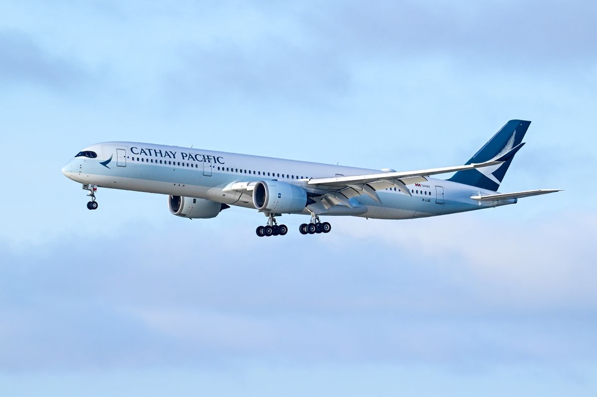 Passenger arrested after trying to open plane door mid-flight from Boston to Hong Kong 1 5da646cd 251211 cathay pacific airlines vl 1109p d1a905