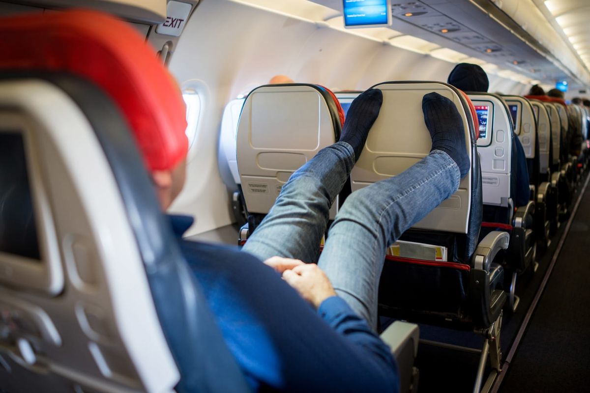 Why are people always debating proper plane etiquette on TikTok? 1 850b248d 230601 air travel feet up stock ac 828p 2c30e5