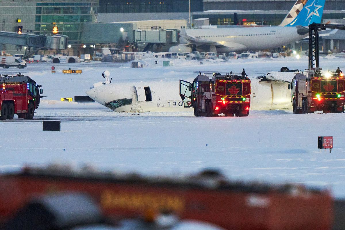 Passenger on flipped Delta jet recalls being upside down and 'hanging from our seat belts' 1 8ae4ae17 250218 toronto mb 0723 1c2765