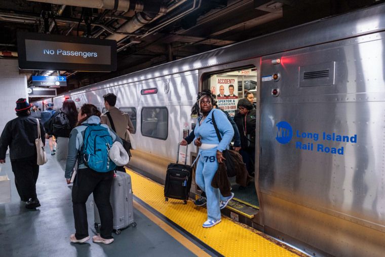 New York braces for chaotic Monday commute amid Long Island Rail Road strike 3 People exit a Long Island Rail Road train cart inside of a station
