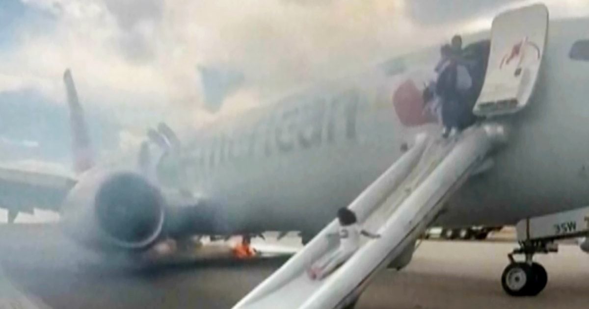 Passengers flee smoking American Airlines jet in Denver after aborted takeoff