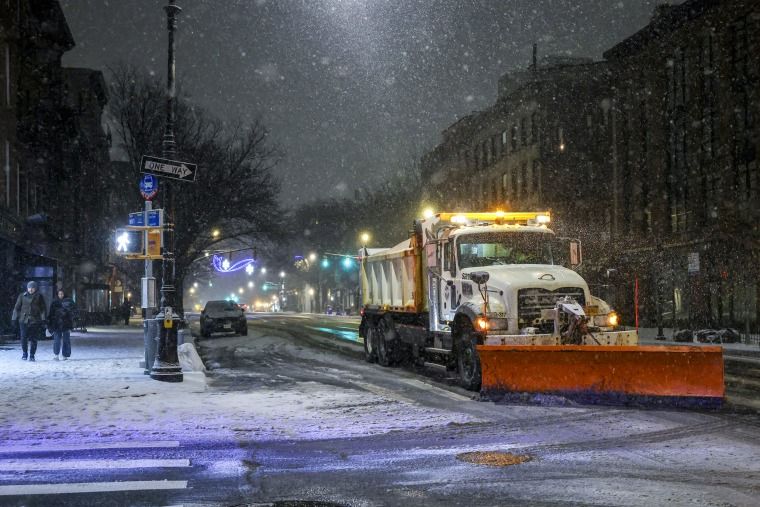 Travel disruptions mount as strong storm system sweeps across the country 1 Snowplows/