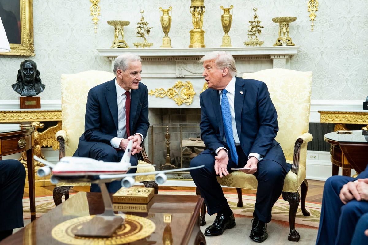 Video: Trump Texts Link Nobel Peace Prize Snub to Greenland 1 Donald Trump and Jonas Gahr Store sit in ornate chairs facing each other, conversing. A white model airplane is on a polished table in the foreground.