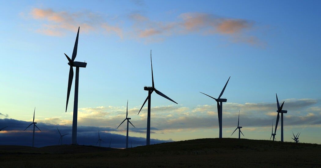 In Biden’s Climate Law, a Boon for Green Energy, and Wall Street