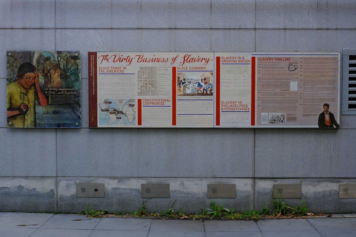 Video: National Park Service Removes Slavery Exhibit in Philadelphia 1 Displays from an exhibit are fixed on a gray wall. One of them reads, “The Dirty Business of Slavery.”