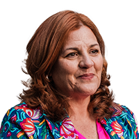 A headshot of Christine Quinn